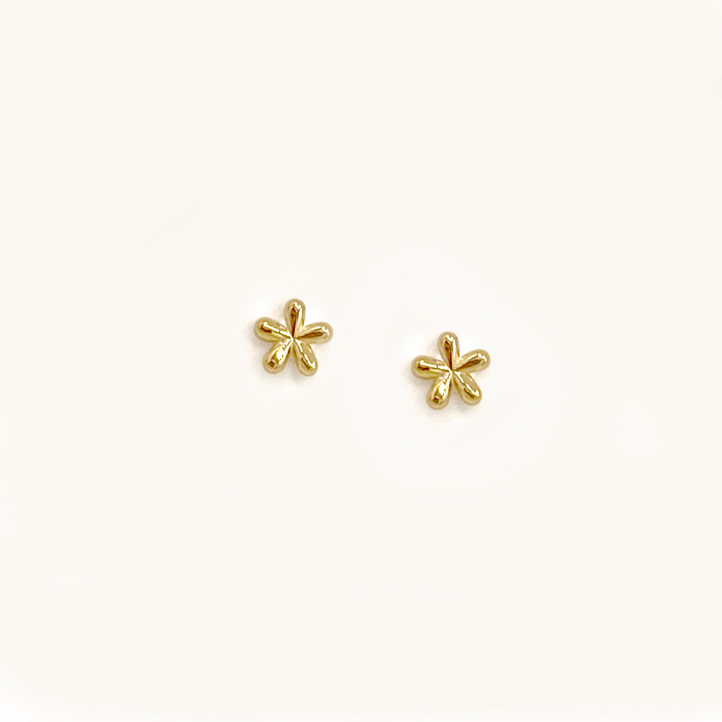 Cute mini daisy flower stud earrings handcrafted in 10K yellow gold.